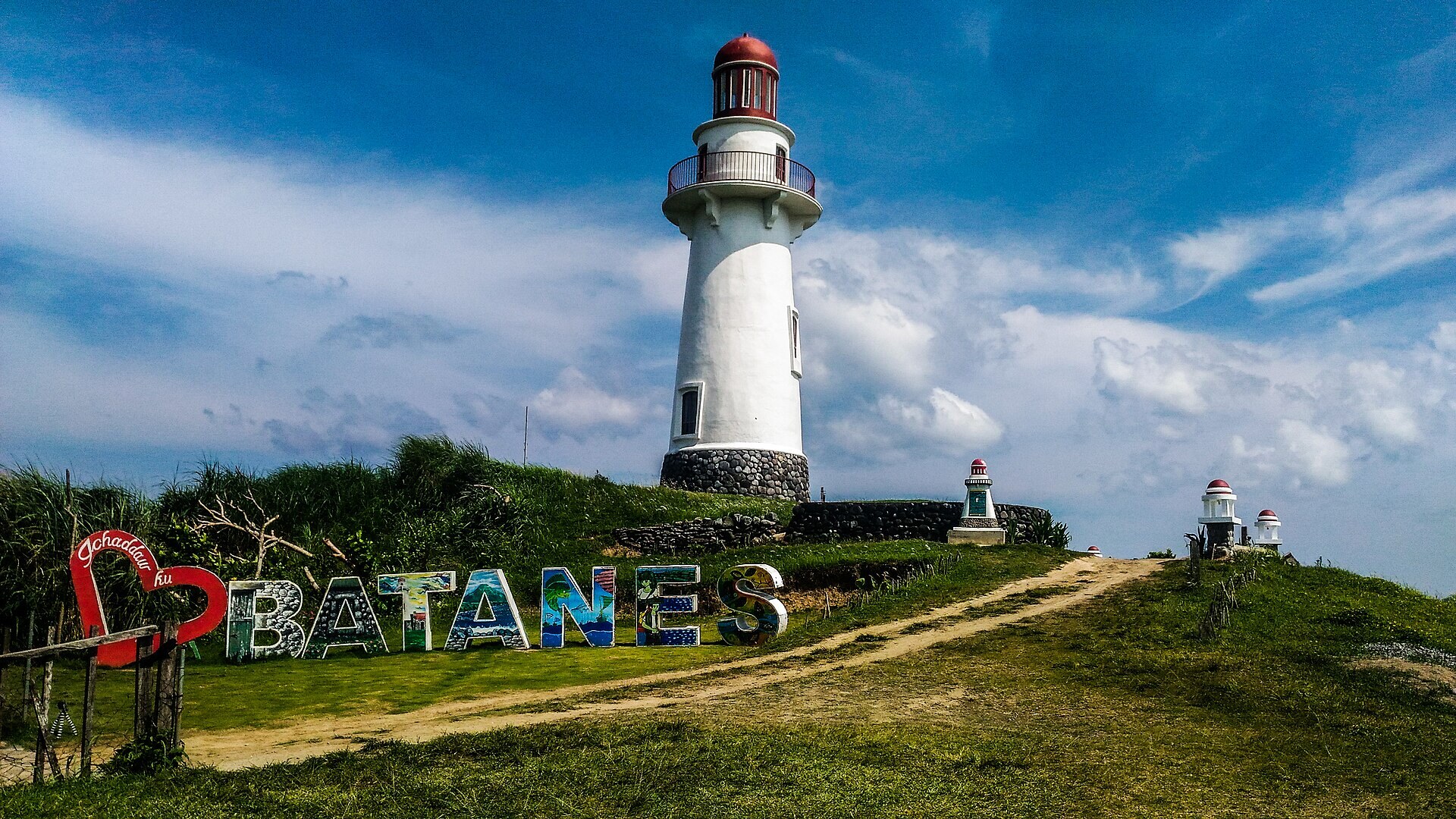 Basco lighthouse above the hills