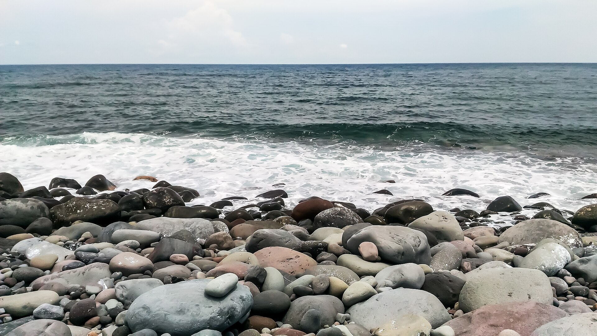 The smooth boulders of Valugan beach